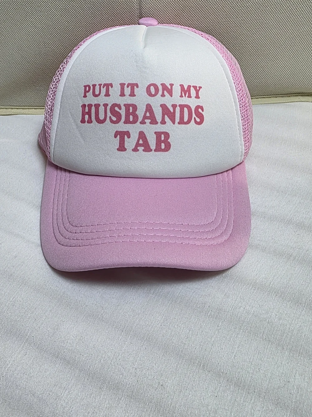 0911 Put It On My Husband's Tab Pink Trucker Hat